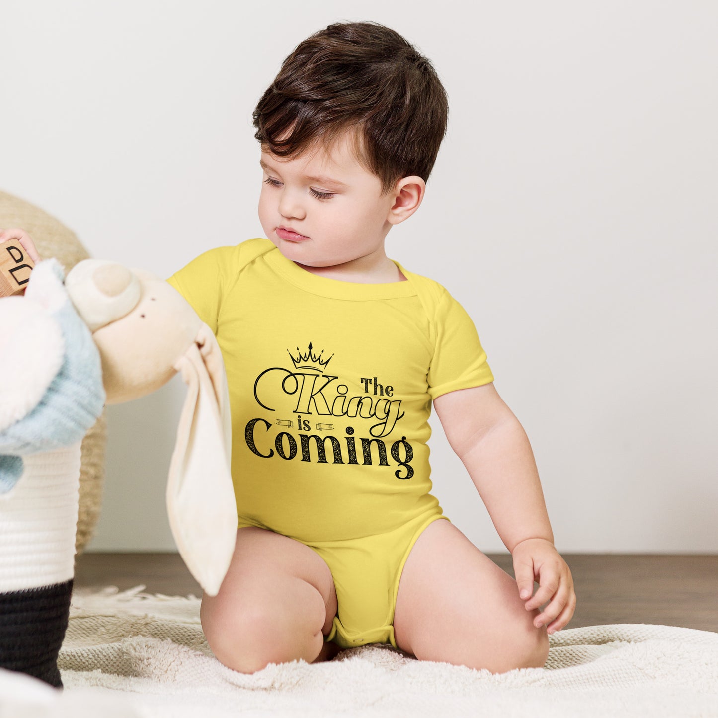 Faith-based baby clothing for baptism or dedication