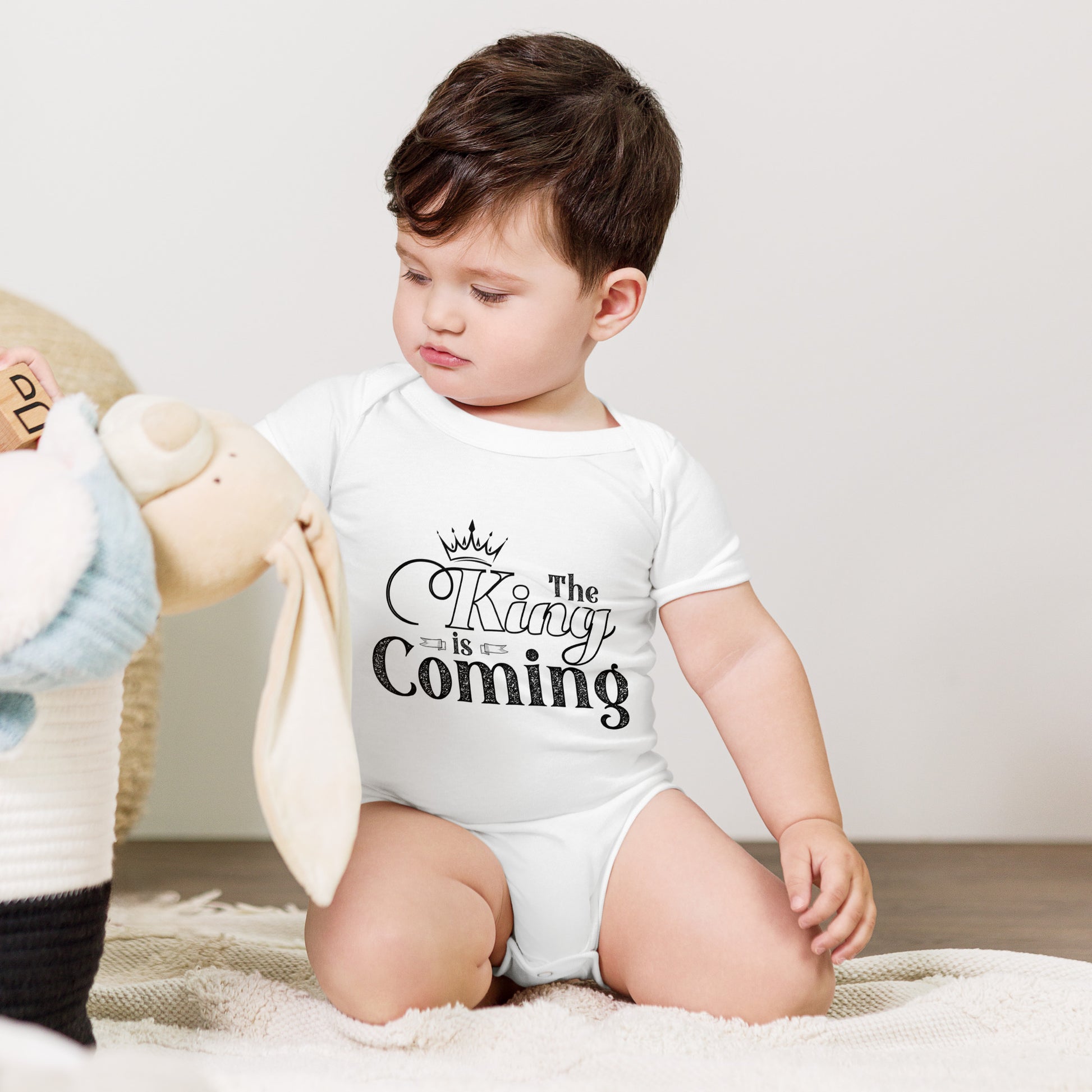 Faith-based baby clothing for baptism or dedication